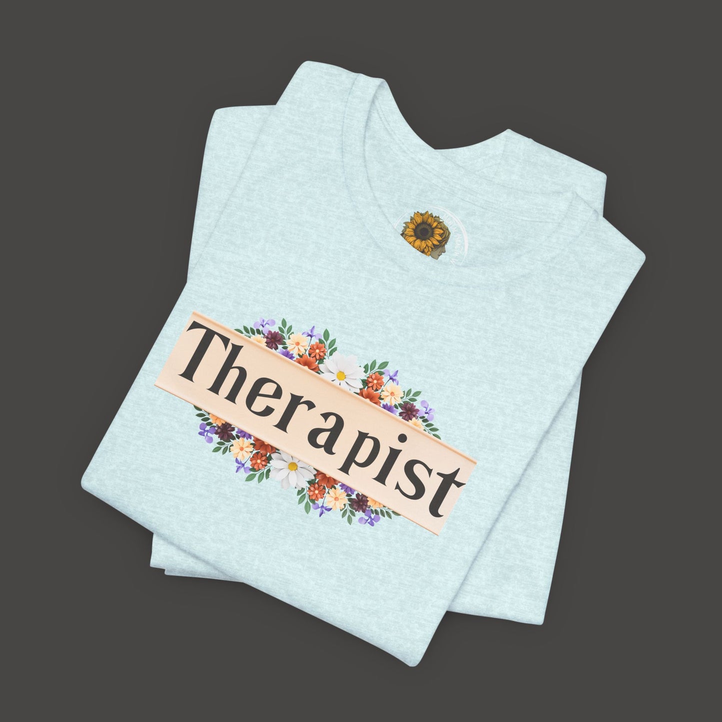 Floral_Therapist_Unisex_Short_Sleeve_Tee_-_Front_Folded_Mock_up_Heather_Prism_Ice_Blue
