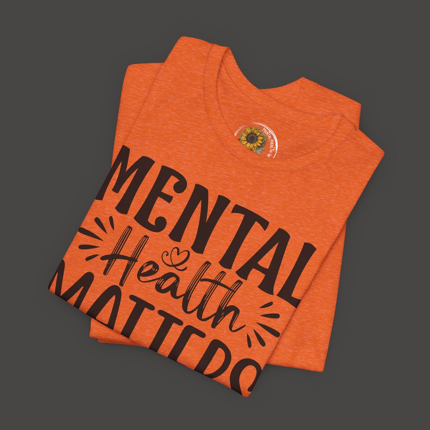 Mental Health Matters Tee Shirt/ folded front view mockup/ heather orange color
