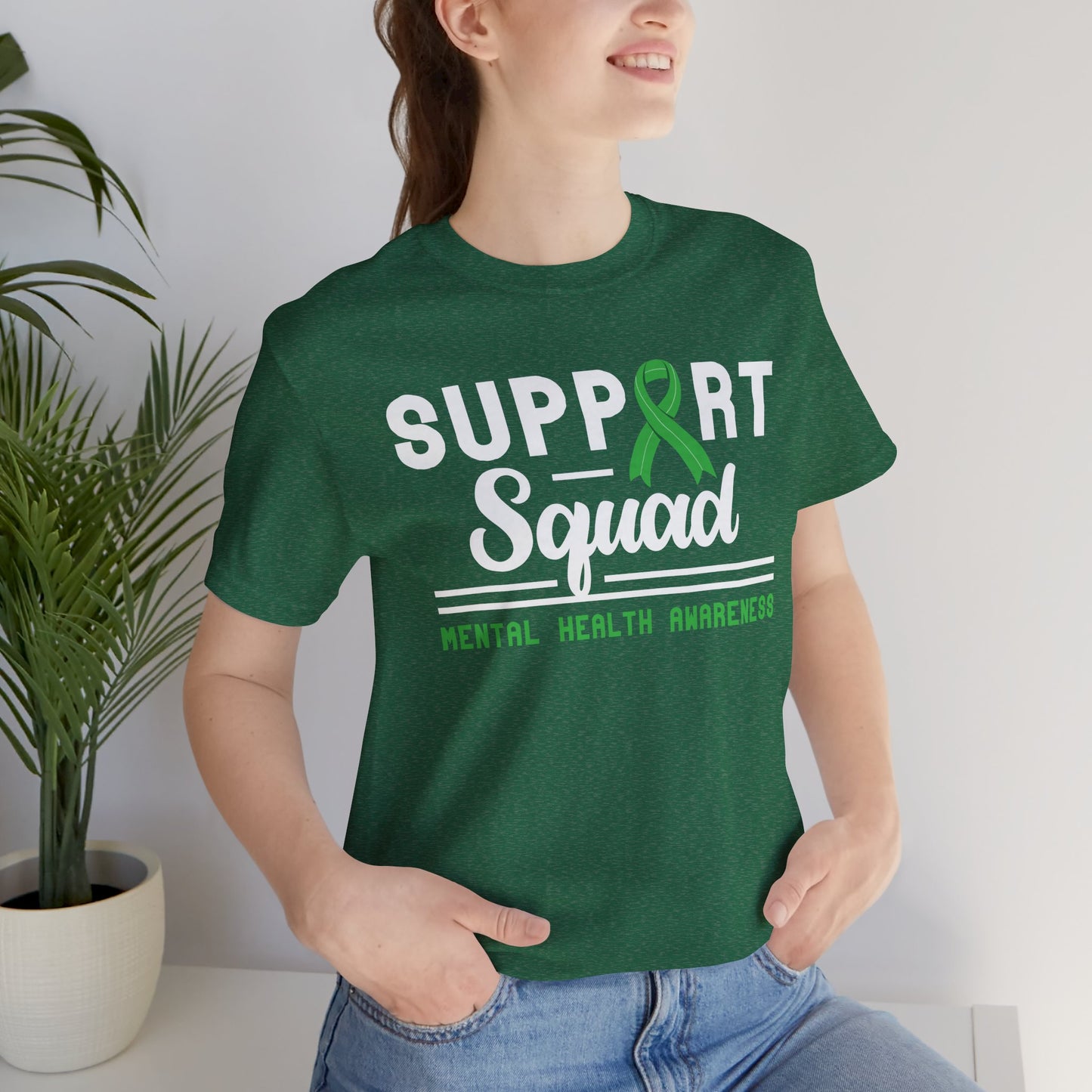 Model wearing mental health support squad shirt-Heather Kelly Green'

