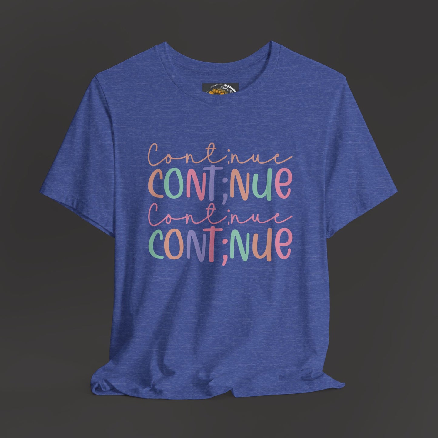 Continue Semicolon/Front View/ Hanging Mockup/ Heather True Blue Color Tee Shirt