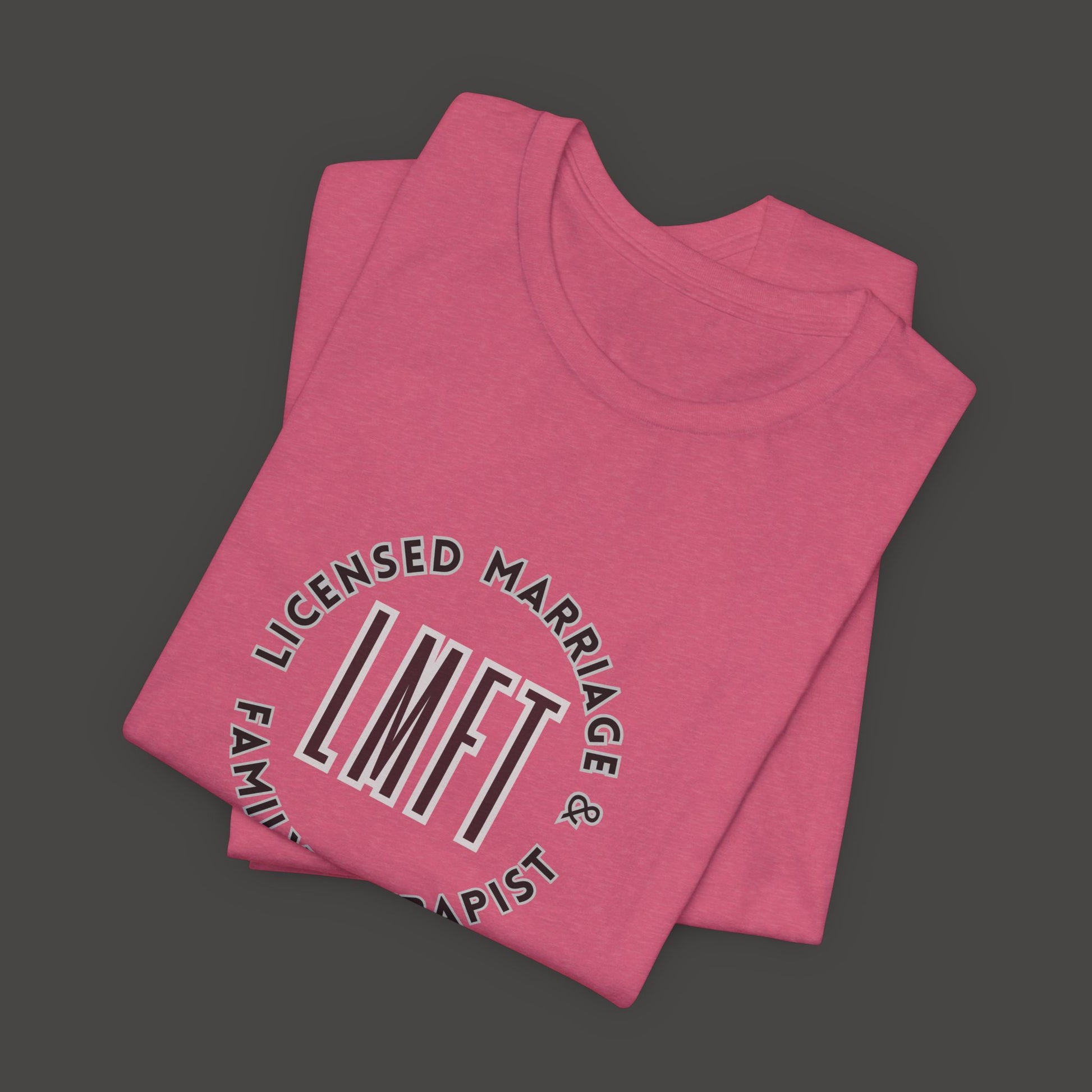 Licensed Marriage & Family Therapist Tee Shirt/Front Folded Mockup/  Heather Charity Pink